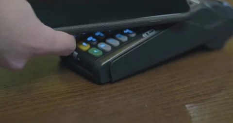 Paying through smart phone using NFC technology. Close-up. 4K modern technology Vídeos de archivo 336585631