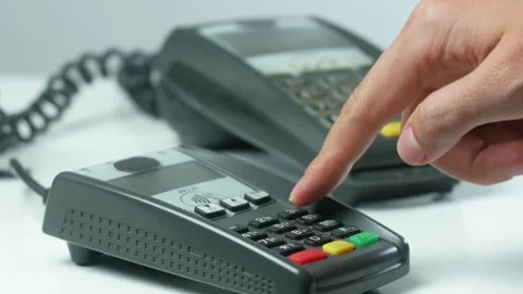 Payment and entering a PIN code at the POS terminal Stock Footage 272793023