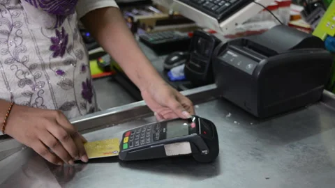PAYMENT WITH CREDIT CARD ON POS MACHINE Stock Footage 130550032