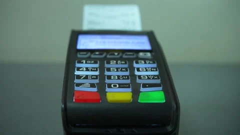 The payment for the goods has been completed and a receipt is printed Stock-Footage 330349173