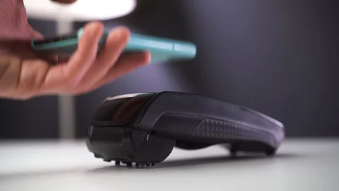 Payment made with smartphone using nfc system Stock Footage 129062688