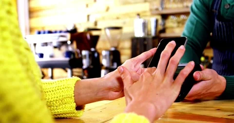 Payment made with smartphone using nfc system mobile phone on cash machine Video stock 336585668