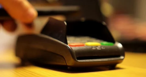 Payment made with smartphone using nfc system mobile phone on cash machine Stock-Footage 336585680