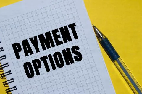 Payment options message written on notebook page on yellow background. Conc.. Fotos Stock