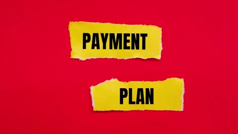 Payment plan message writing on ripped torn yellow paper pieces Vídeo Stock 282595550