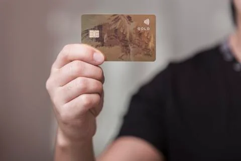 Payment plastic card in hands Stock Photos