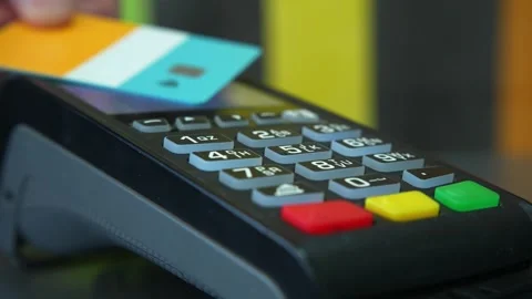 Payment with POS-terminal in store. NFC credit card payment. Close up Stock Footage 265020949