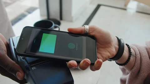 Payment Process on Smartphone Touching Terminal in Cafe Stock Footage 246908242