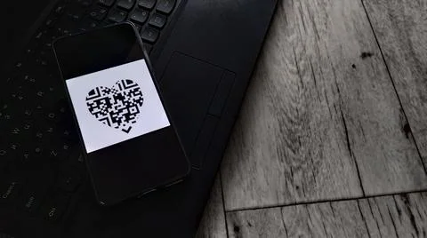 Payment by QR code. QR code in the shape of a heart.  Vacation 2022 Stock Photos
