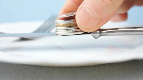 Payment in a restaurant, cafe. Fork, knife in a plate and money.Pays dinner Stock Footage 201462958