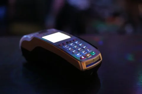 Payment terminal on the table Фото