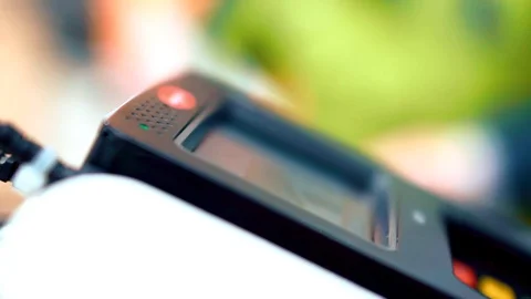 Payment in a trade with nfc system and contactless card. Selective focus Stock-Footage 102897955
