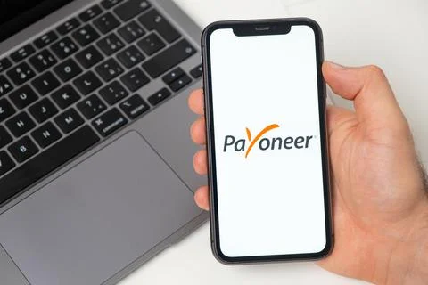 Payoneer payment system allows to make money transfers. Online shopping with Stock Photos