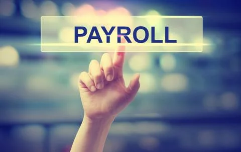 Payroll concept with hand pressing a button Foto stock