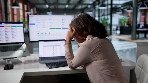 Payroll Manager Carefully Reviews Software Stock Footage 335459316