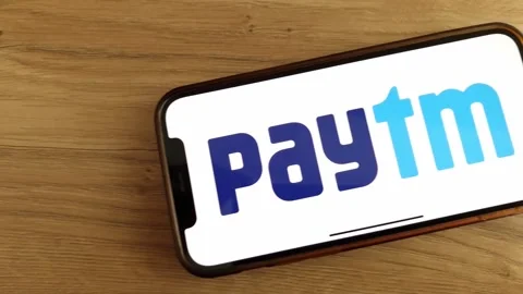 Paytm logo displayed on mobile phone Stock Footage 241746953