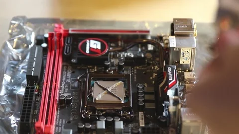 PC Builder install a cooling fan on the processor (CPU) Video stock 102192694