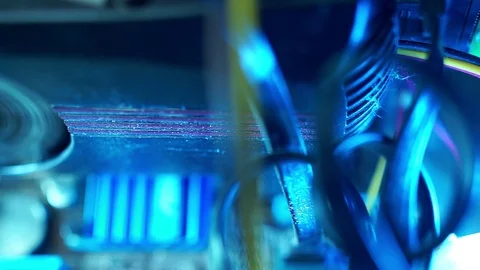 PC components in dust. Extra close-up, running video card fan inside the Stock Footage 101872925