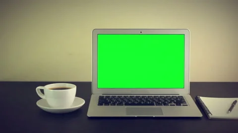 PC computer with coffee cub and notebook on table Video stock 64912830