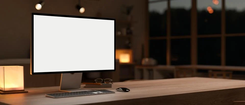 A PC computer mockup on a hardwood table in a cosy, modern room at night. d.. 스톡 일러스트