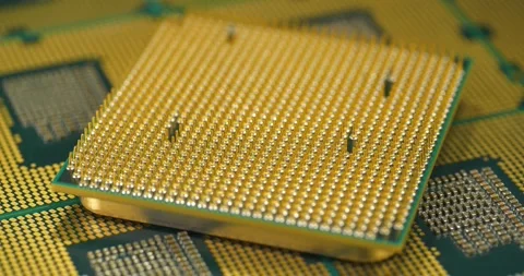 PC CPU close up highlighting micro pin arrangement for high speed computing Stock Footage 334002368