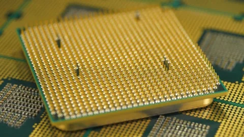 PC CPU close up highlighting micro pin arrangement for high speed computing Stock Footage 342142524