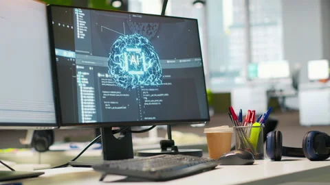 PC display on startup office desk showing artificial intelligence code Stock Footage 313015701