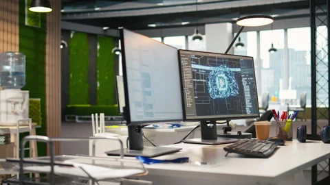 PC in empty IT startup office displaying artificial intelligence code Stock Footage 313164939