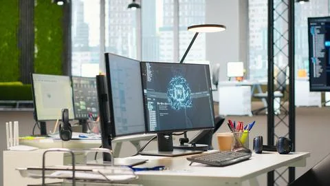 PC in empty tech startup office displaying AI neural networks 写真素材