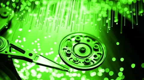 Pc hard disk with Fiber optics background, shot in HD Video stock 65824004