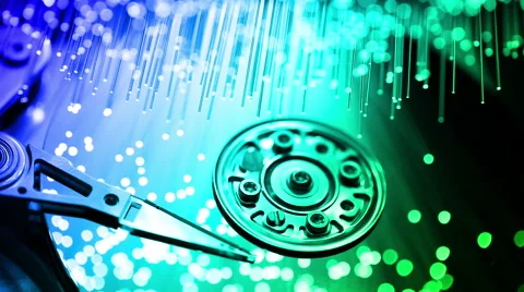 Pc hard disk with Fiber optics background, shot in HD Video stock 66335735