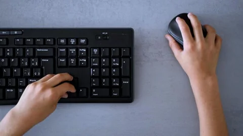 Pc keyboard and mouse with child's hands playing computer games Stock-Footage 130661504