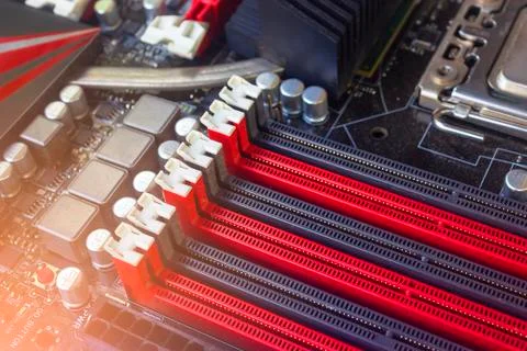 PC Mainboard memory slots and components. Close up with selective focus Stock Photos