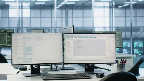 PC monitors on desk used for checking potential system failures in server room Stock Footage 319248608