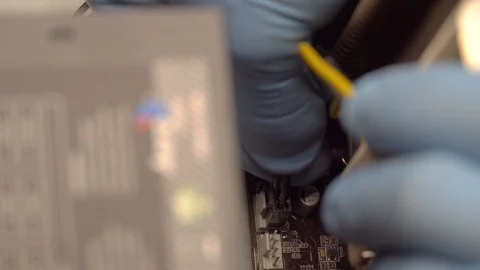 PC parts are assembled, inserted, pulled out cooler connector from motherboard. 스톡 동영상 120089503