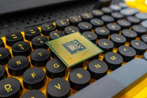 PC Processor Chip Resting on Round Keycap Mechanical Keyboard 写真素材