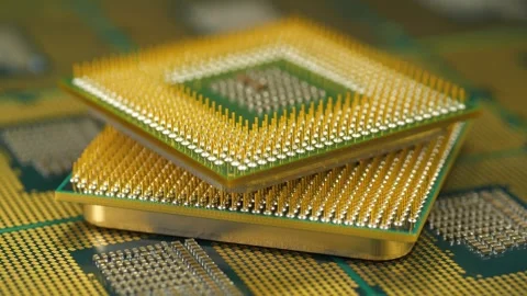 PC processors with golden pins and contacts for modern computer hardware 库存影片 344697889