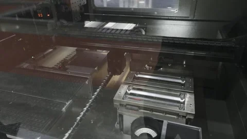 PCB assembly machine in Electronics manufacturing SMT production line. Indust Video stock 337543600