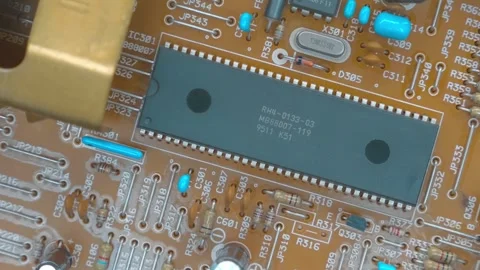 PCB with capacitors, transistors, resistors, microchip and fuse Stock Footage 259783909