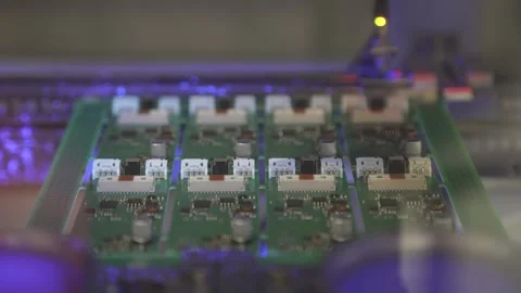 PCB enters the conveyor for application of protective varnish. Automatic PCB Stock Footage 252646783