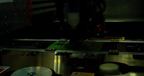 PCB moving on a conveyor belt during automated optical inspection Video stock 336557004