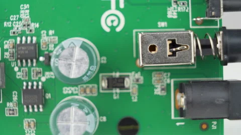 PCB (Printed Circuit Board) with different components, macro shot Stock Footage 144021377