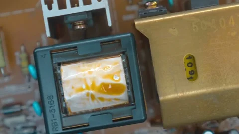 PCB with transformers, coils, capacitors, transistors, resistors, microchip Stock Footage 259758558