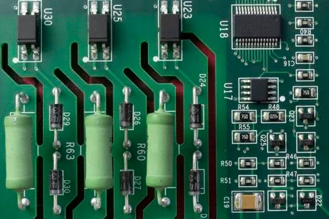 PCB Transistors and Capacitors Stock Photos