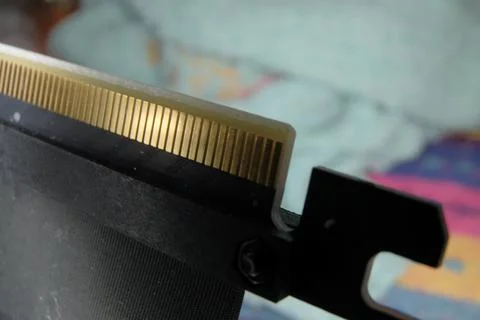 PCI-e socket macro shot with coupling. Stock Photos