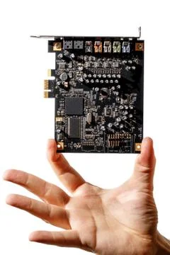PCI Express card for computer in hand, audio chip Stock Photos