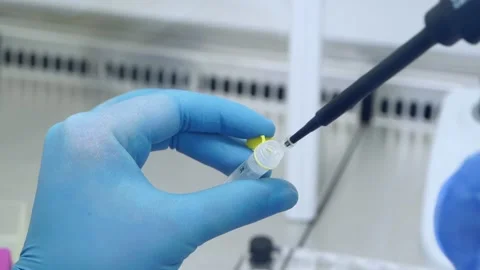 PCR test taking a sample from the tube coronavirus tube Stock Footage 149080318