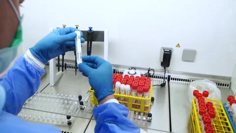 PCR test taking a sample from the tube coronavirus tube Stock Footage 149080334