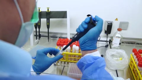 PCR test taking a sample from the tube coronavirus tube Stock Footage 149348348