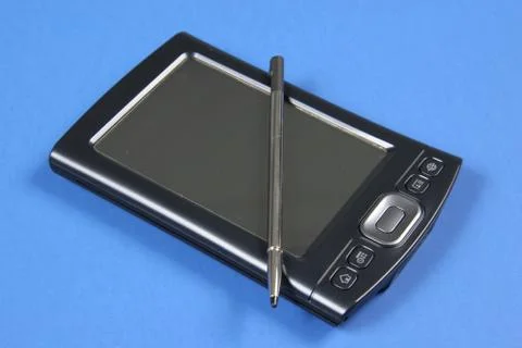 Pda on blue background Stock Photos